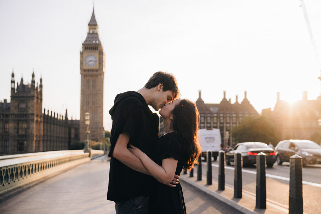 Couple kissing in front of Big Ben in London. A good place to show what shaped Eugene Kim Photography