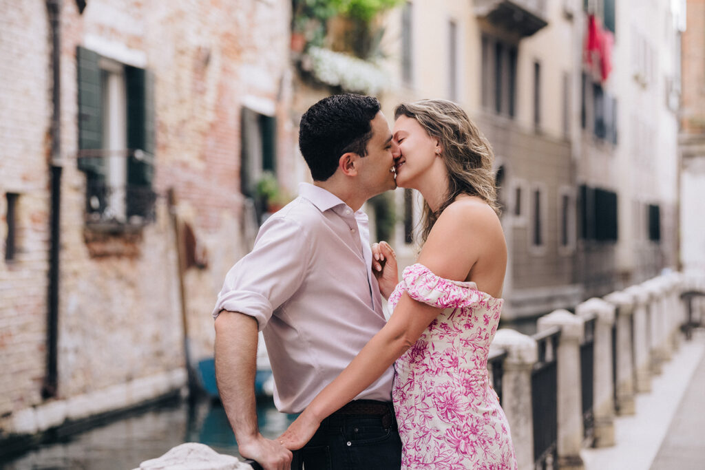 Couple Photo of couple kissing by the Venice Canal