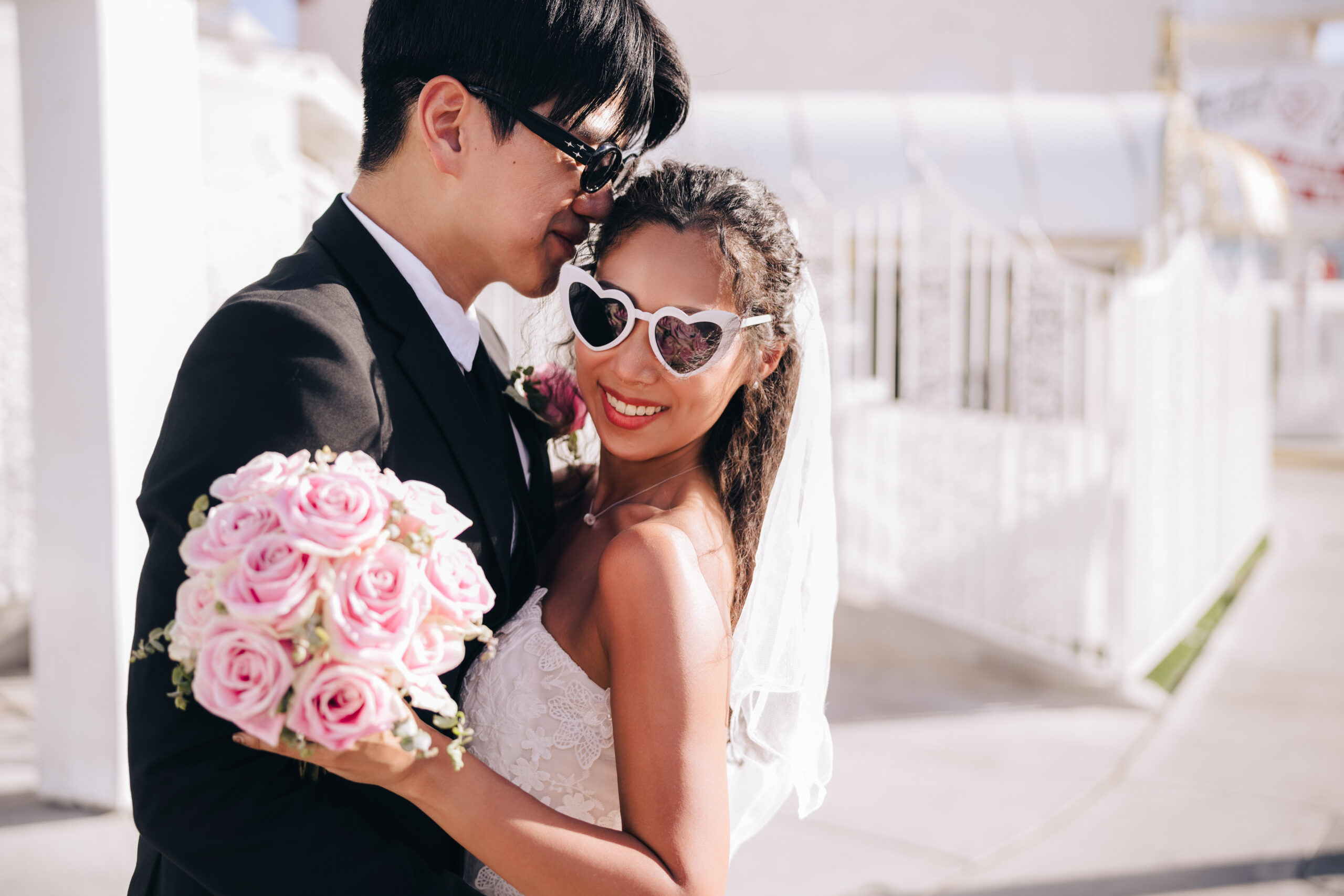 A couple during the wedding at little white wedding chapel