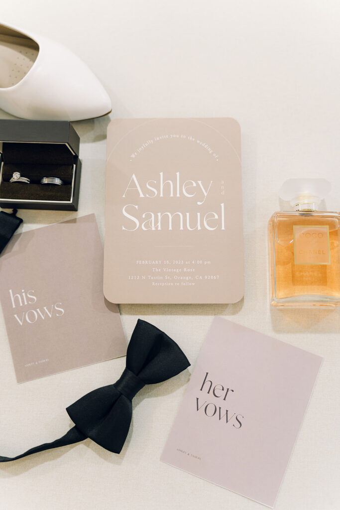 Wedding Timeline Without a Planner: Detail shots of wedding rings and wedding invitations