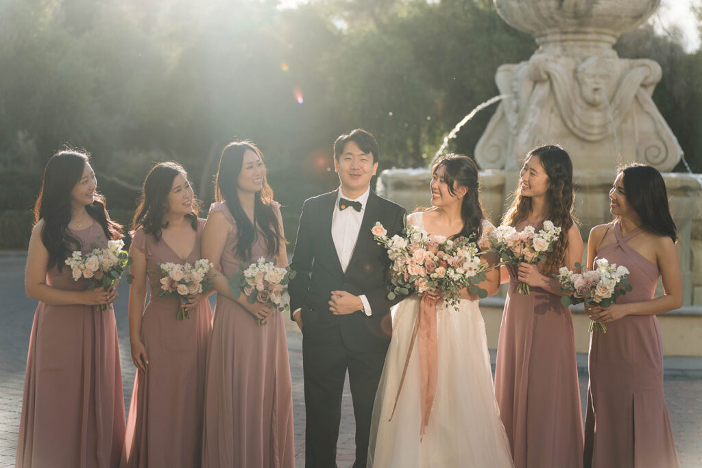 Bride and Groom having fun with the bridal party