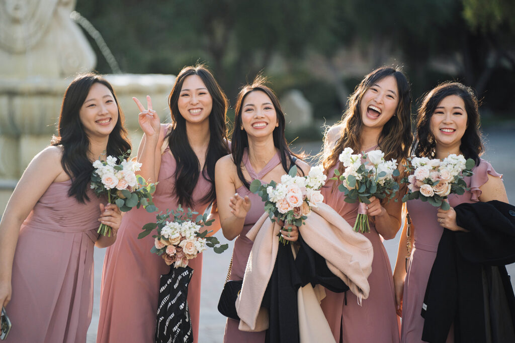 Bride and Groom having fun with the bridal party