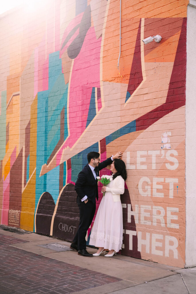 Engagement session under the neon lights of Fremont Street in downtown Las Vegas at night