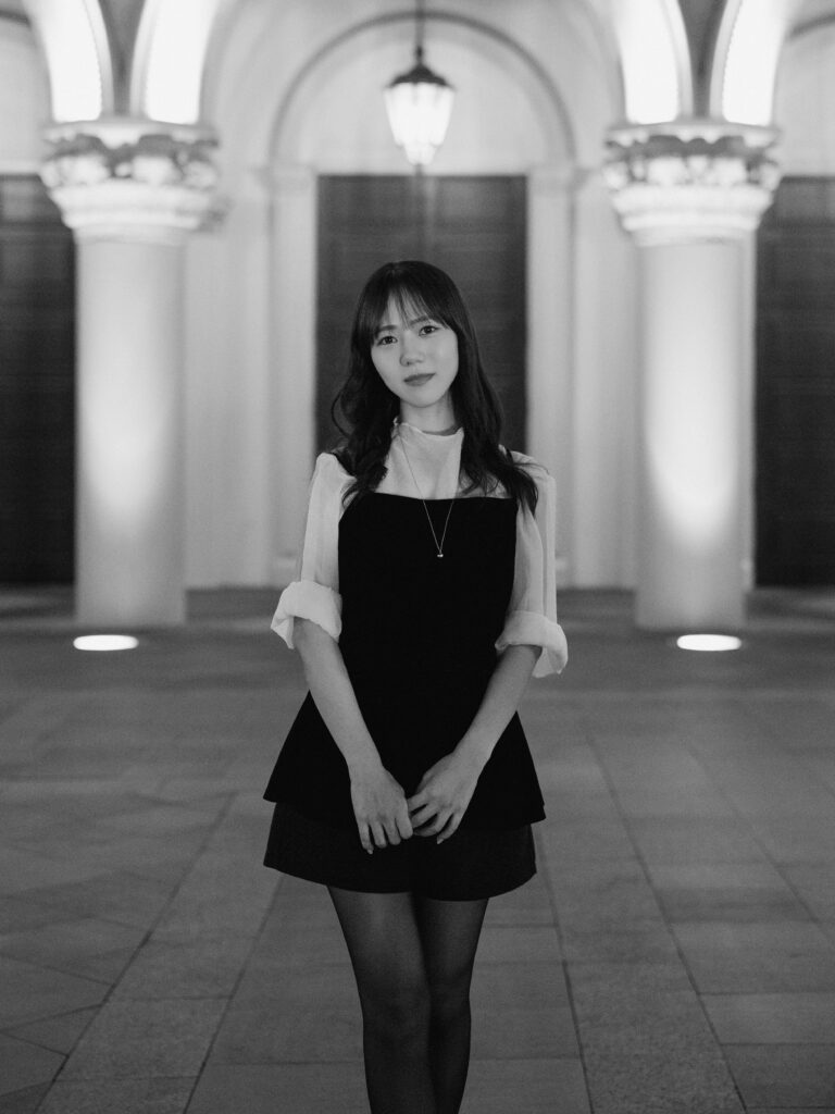 Black and white portrait under the Venetian arches during a Las Vegas engagement session